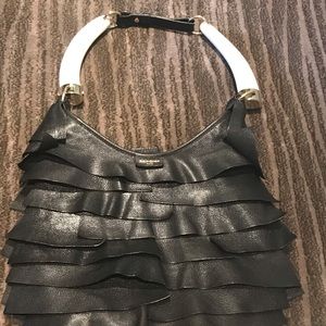 YVES SAINT LAURENT
Leather St. Tropez Horn Bag